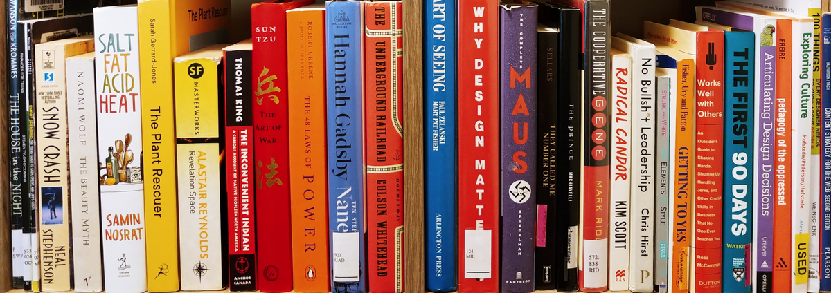 Picture showing books on design, science fiction and other topics.
